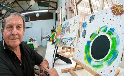 Don McKetin with his works Pterosaur and Black Hole – he has been surprised by the enjoyment he finds in painting and his sense of humour is reflected in his topics, treatment and titles. Don McKetin with his works Pterosaur and Black Hole – he has been surprised by the enjoyment he finds in painting and his sense of humour is reflected in his topics, treatment and titles.